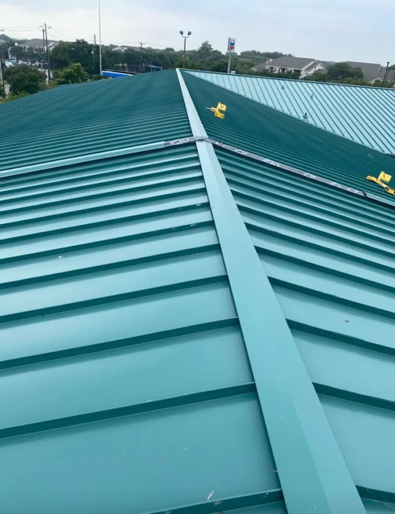Green commercial metal roof ridge and valley for Metal Roof Repair in East Longmeadow