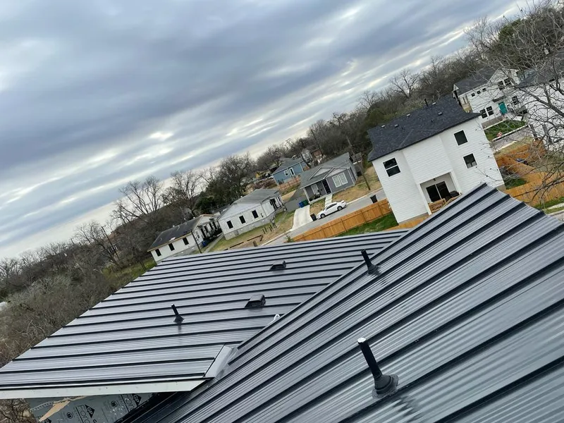 Standing seam metal roof panels with vents for Skylight Repair in East Longmeadow